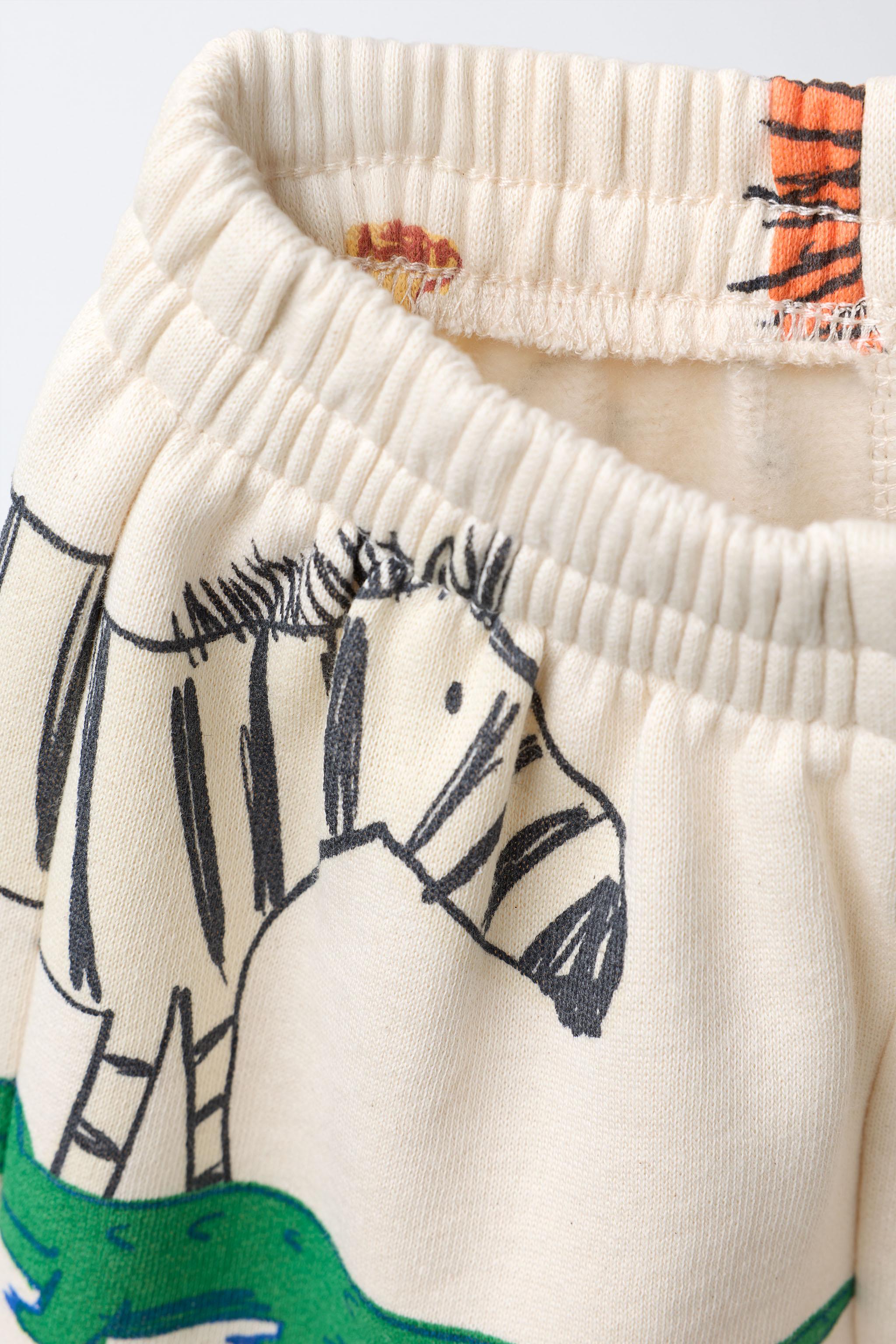 JOGGING SET: SWEATSHIRT AND ANIMAL PRINT JOGGER PANTS